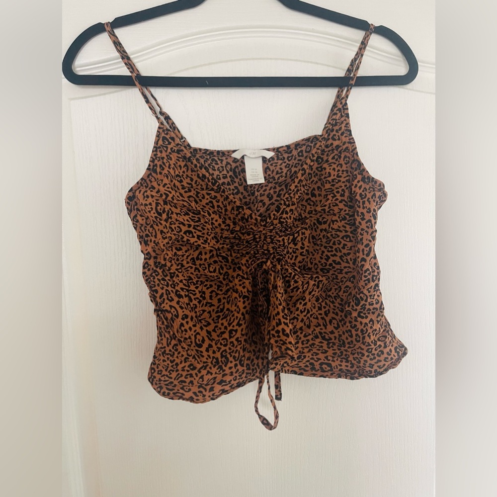 Cheetah print tank top.
